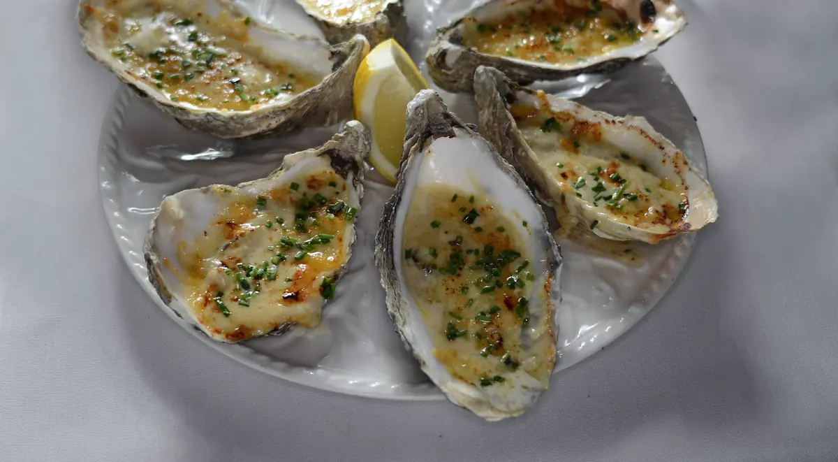 Grilled Jersey oysters with a Parmesan crust and lemon